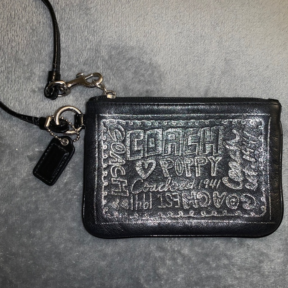 Black and silver coach wristlet